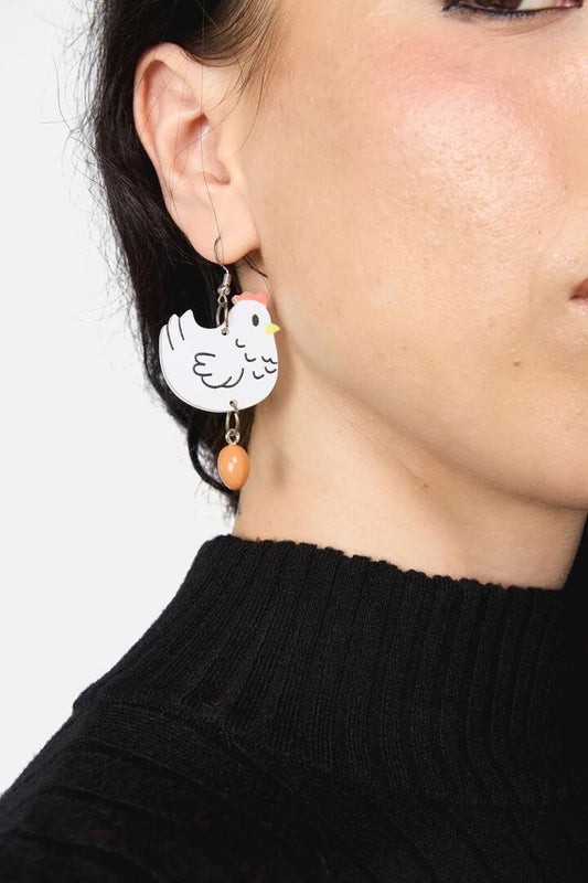 Image of Earrings. Productname: Chicken & Egg Earrings in White colour by brand - Dangerfield