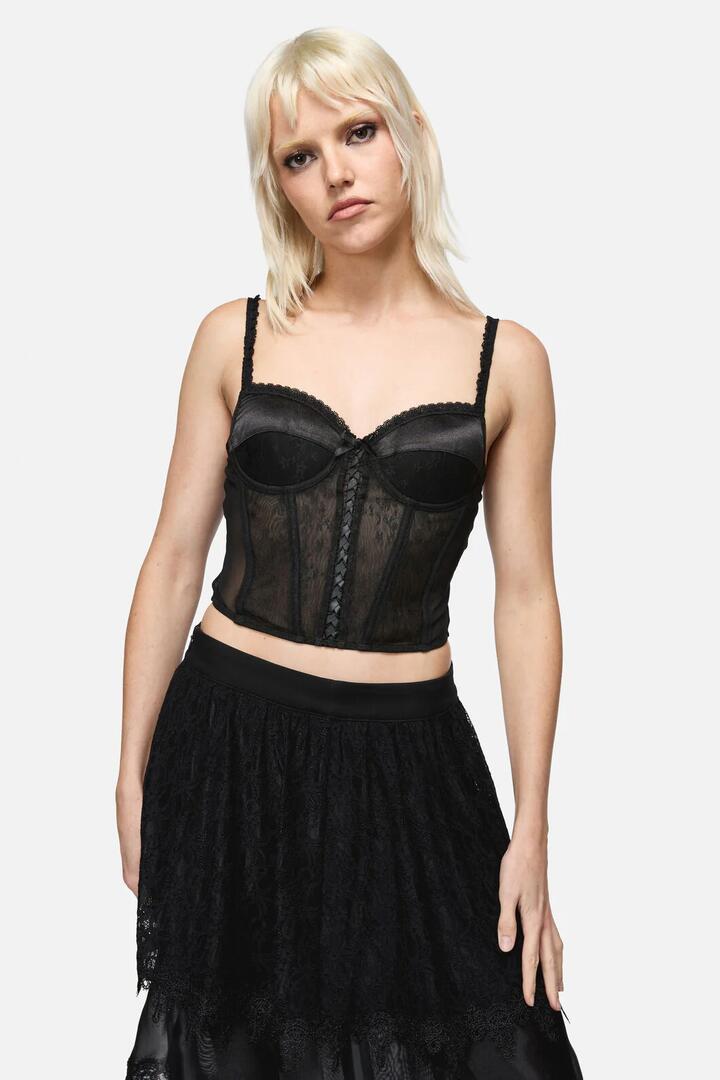 Image of a model wearing Tops. Productname: Constance Corset Top in Black colour by brand - Dangerfield