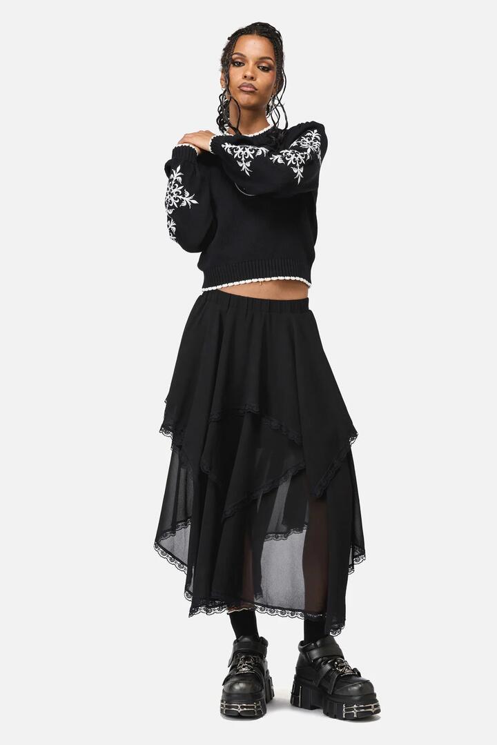 Image of a model wearing Skirts. Productname: Phantom Goth Midi Skirt in Black colour by brand - Black Friday