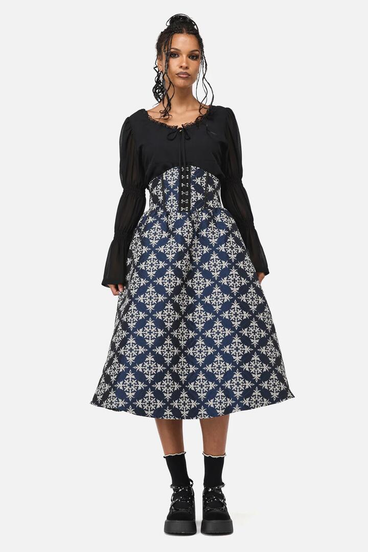 Image of a model wearing Skirts. Productname: Dame Brocade Skirt in Navy colour by brand - Black Friday