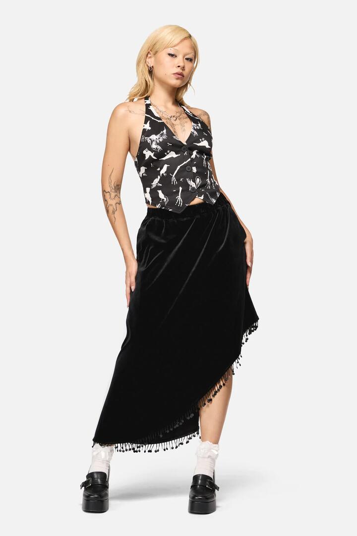 Image of a model wearing Skirts. Productname: Wingspan Asymmetric Basic Skirt in Black colour by brand - Black Friday