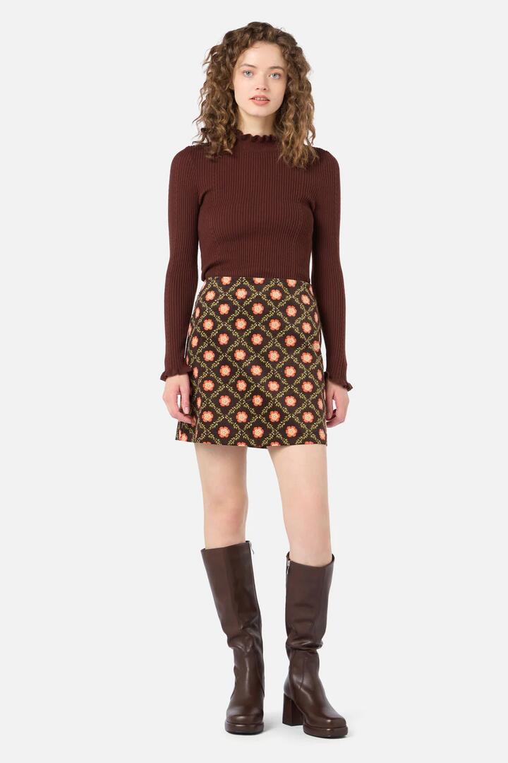 Image of a model wearing Skirts. Productname: Delilah Cord Mini Skirt in Chocolate colour by brand - Princess Highway