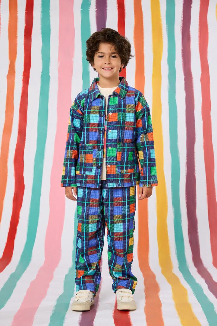 Image of a model wearing Pants. Productname: Navy Check Kids Cord Pant in Navy colour by brand - Gorman
