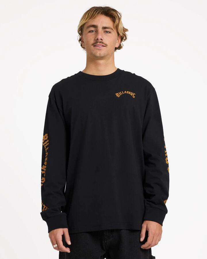 Image of a model wearing Tops. Product name - Billabong Mens Otis Arch Long Sleeve T-Shirt Black in Black colour by brand - Billabong