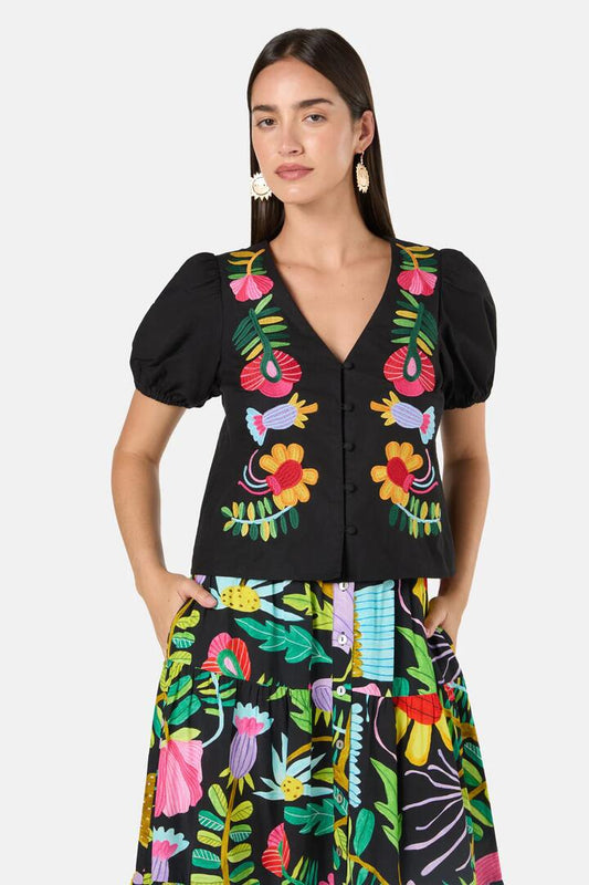 Image of a model wearing Tops. Product name - Whimsical Embroidered Top in Black colour by brand - Gorman