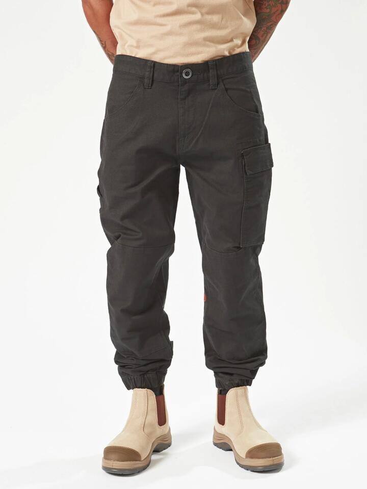 Image of a model wearing Pants. Product name - Volcom Mens Caliper Cuffed Carpenter Pants Black in Black colour by brand - Volcom