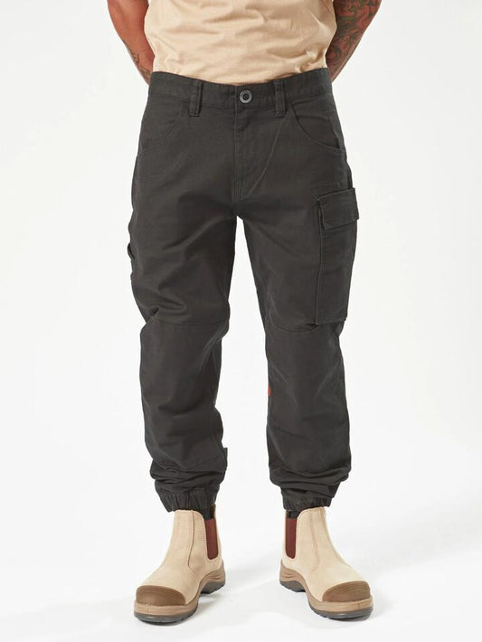 Image of a model wearing Pants. Product name - Volcom Mens Caliper Cuffed Carpenter Pants Black in Black colour by brand - Volcom