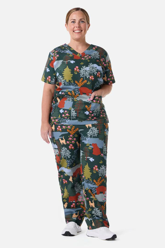 Image of a model wearing Uniforms & Workwear. Productname: Woodland Bear Scrub Set in Green colour by brand - Scrubs With Love