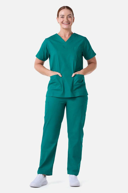 Image of a model wearing Uniforms & Workwear. Product name - Scrubswithlove Pine Scrub Set in Pine colour by brand - Scrubs With Love