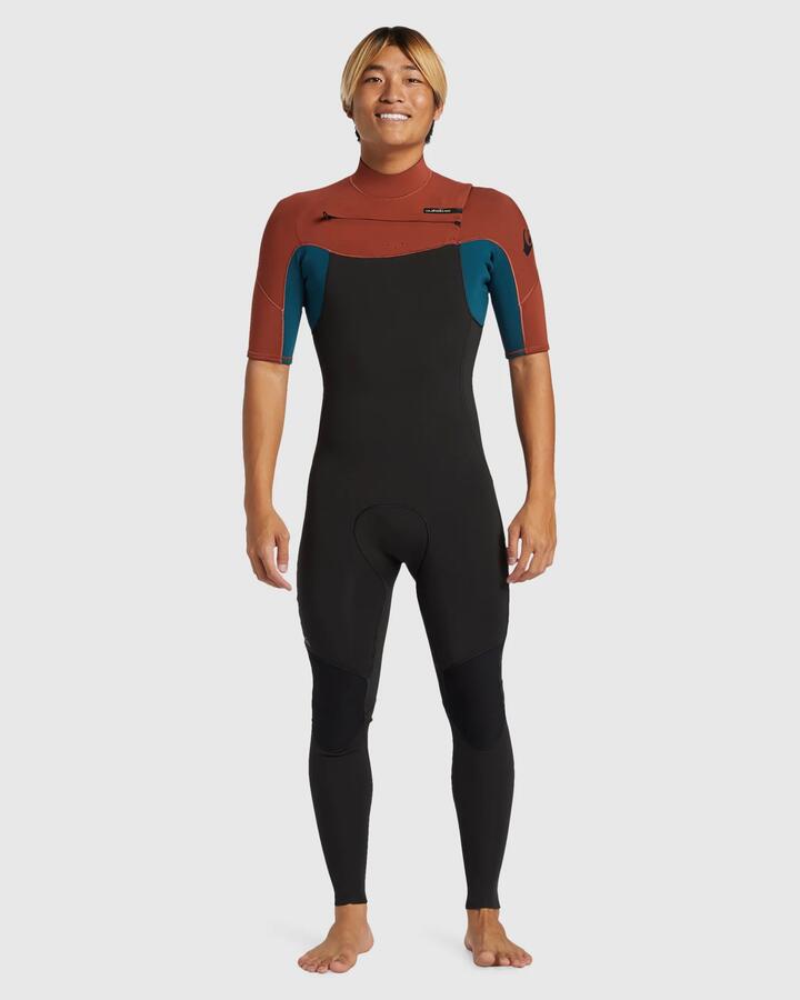 Image of a model wearing Tops. Product name - Quiksilver Mens 2/2Mm Everyday Sessions Short Sleeve Springsuit Burnt Henna in Burnt Henna colour by brand - Quiksilver