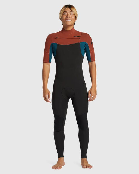Image of a model wearing Tops. Product name - Quiksilver Mens 2/2Mm Everyday Sessions Short Sleeve Springsuit Burnt Henna in Burnt Henna colour by brand - Quiksilver