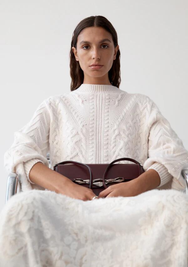 Image of a model wearing Outerwear. Productname: Noelle Knit Jumper in Chalk colour by brand - MOS The Label