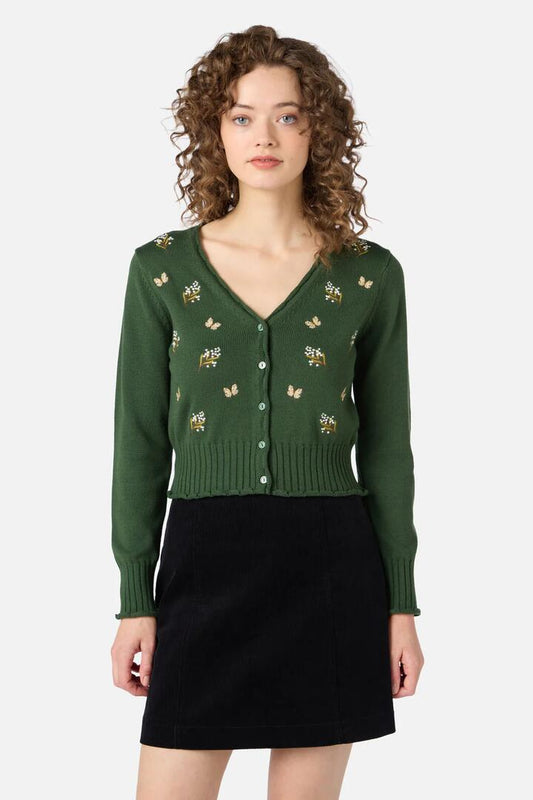 Image of a model wearing Outerwear. Productname: Wattle & Butterfly Cardigan in Green colour by brand - Princess Highway