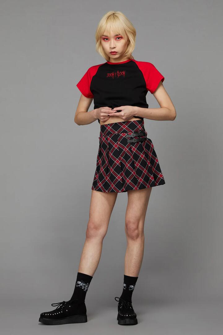 Image of a model wearing Skirts. Productname: Batty Goth Tartan Skort in Red/Black colour by brand - Black Friday