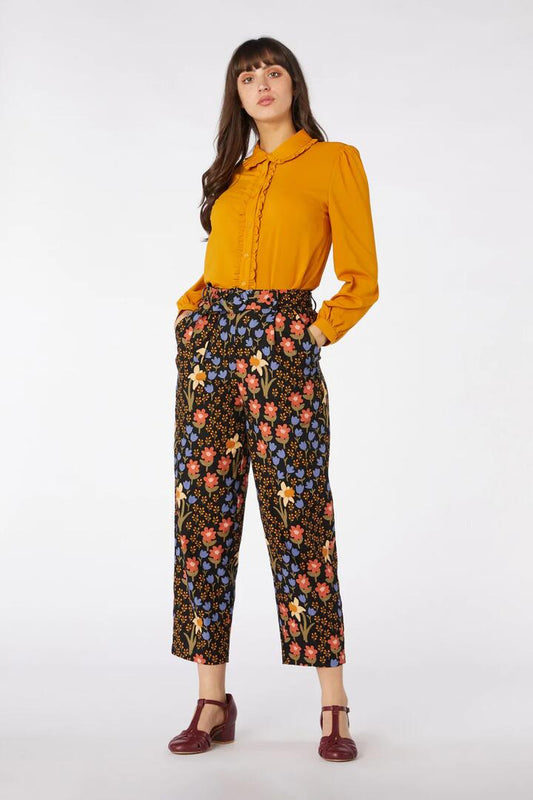 Image of a model wearing Pants. Productname: Winona Flower Pant in Black colour by brand - Princess Highway