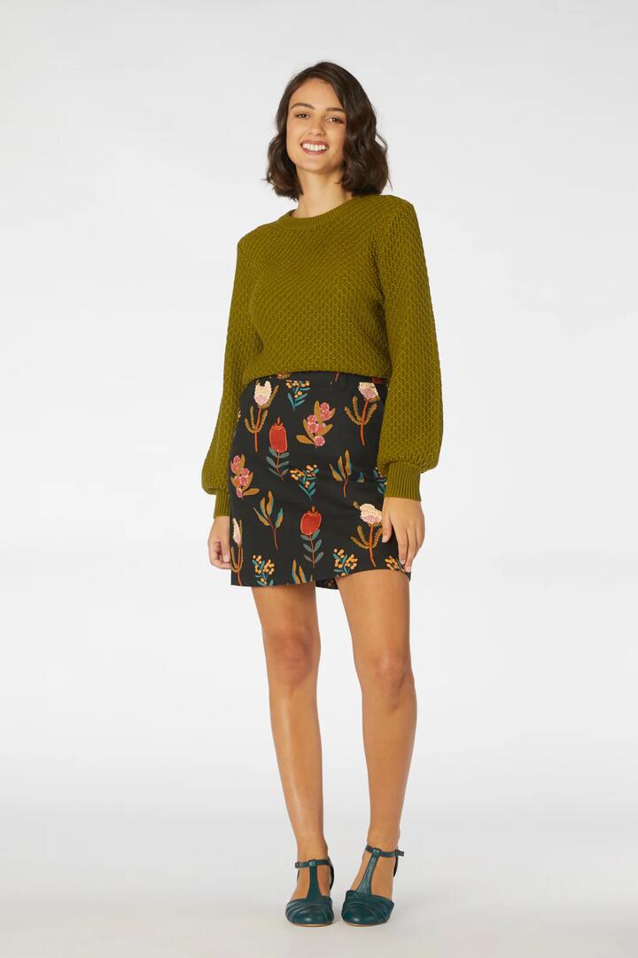 Image of a model wearing Skirts. Productname: Bella Native Skirt in Black colour by brand - Princess Highway