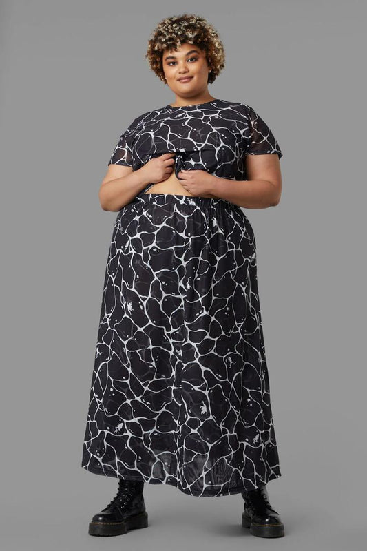 Image of a model wearing Skirts. Productname: Curve Lily Pad Skirt in Black colour by brand - Black Friday