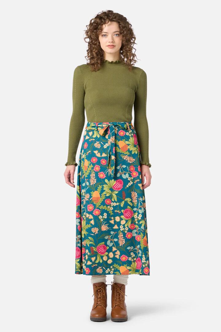 Image of a model wearing Skirts. Productname: Florence Native Midi Skirt in Teal colour by brand - Princess Highway