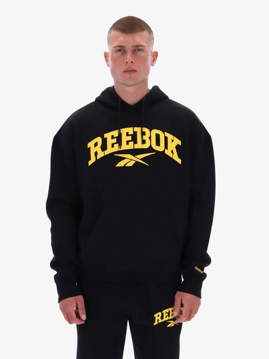 Image of a model wearing Outerwear. Productname: Reebok Colman Hoody in Black colour by brand - Reebok
