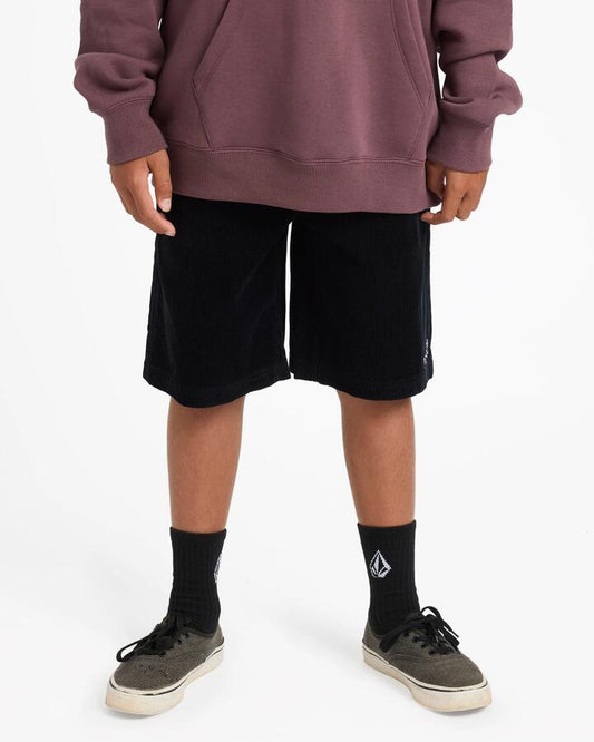 Image of a model wearing Shorts. Product name - Volcom Boys 8-16 Outer Spaced Walkshorts Black in Black colour by brand - Volcom
