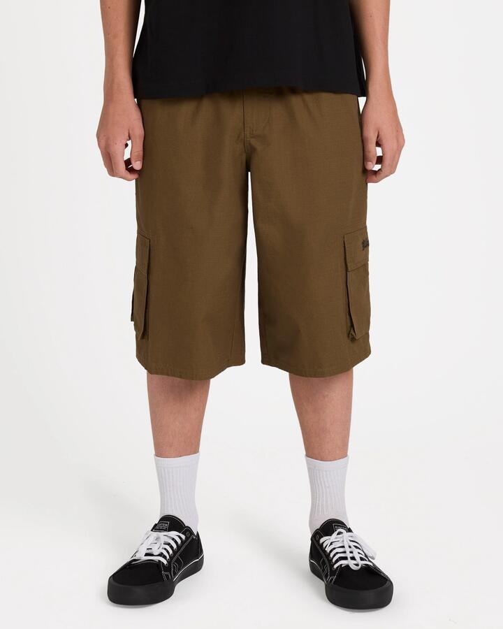 Image of a model wearing Shorts. Product name - Billabong Mens Immortal Cargo Shorts Gravel in Gravel colour by brand - Billabong