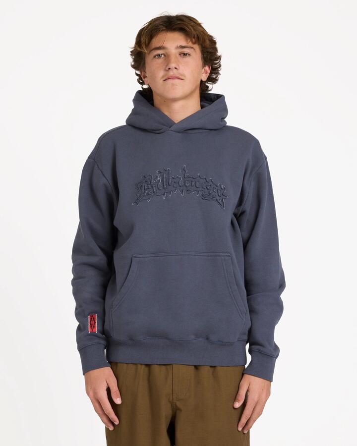 Image of a model wearing Outerwear. Product name - Billabong Mens Immortal Distress Pullover Hoodie Dirt Navy in Dirt Navy colour by brand - Billabong