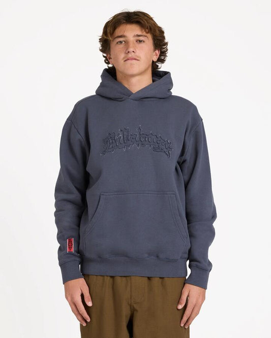 Image of a model wearing Outerwear. Product name - Billabong Mens Immortal Distress Pullover Hoodie Dirt Navy in Dirt Navy colour by brand - Billabong