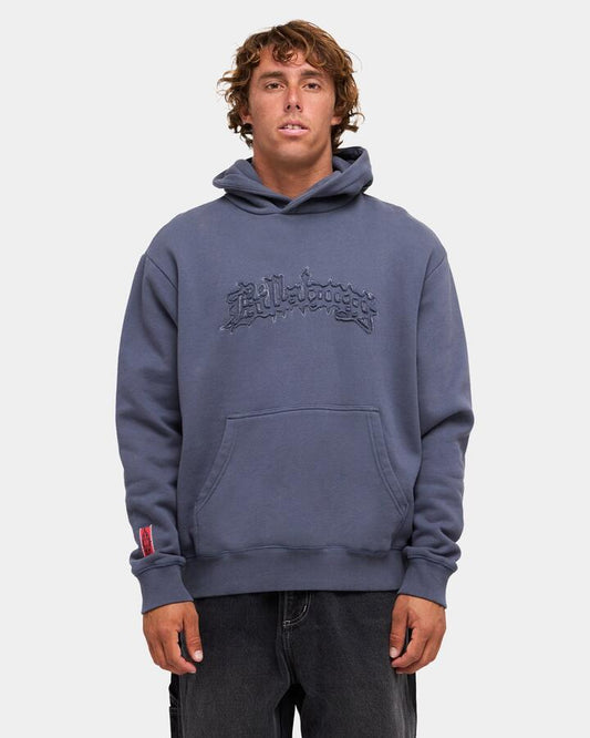 Image of a model wearing Outerwear. Product name - Billabong Mens Immortal Distress Pullover Hoodie Dirt Navy in Dirt Navy colour by brand - Billabong