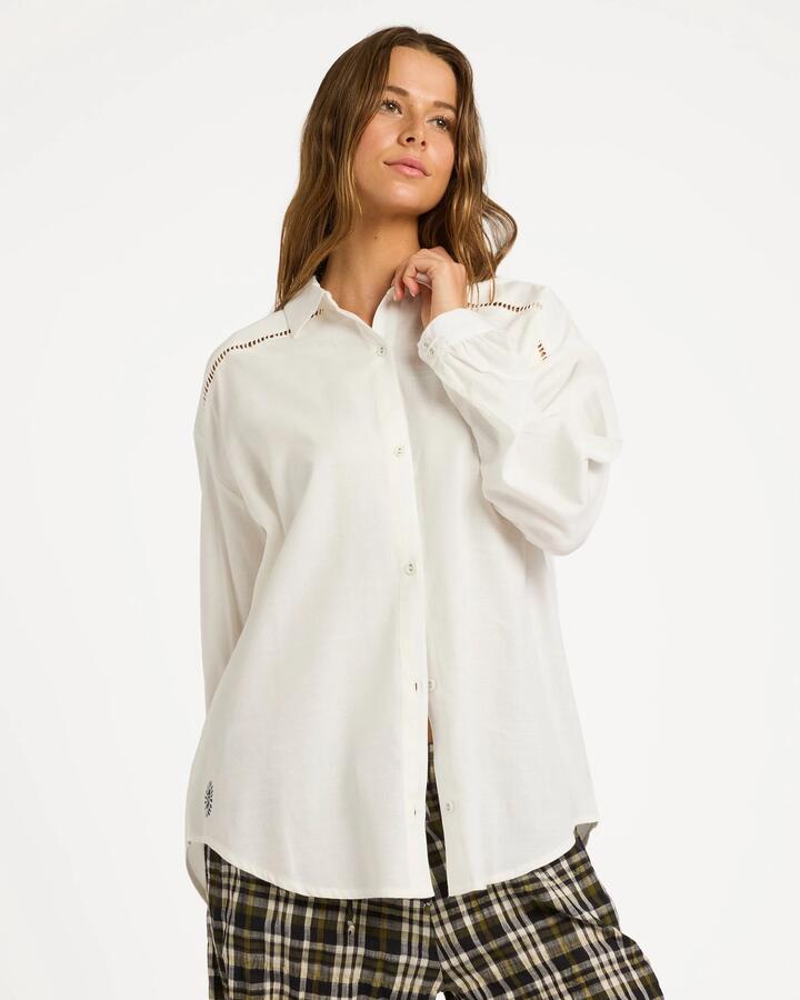 Image of a model wearing Tops. Product name - Billabong Womens Coastal Crush Long Sleeve Shirt Salt Crystal in Salt Crystal colour by brand - Billabong