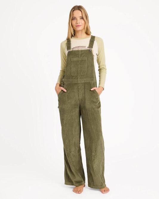 Image of a model wearing Pants. Product name - Billabong Womens Vacay Cord Overall Canteen in Canteen colour by brand - Billabong