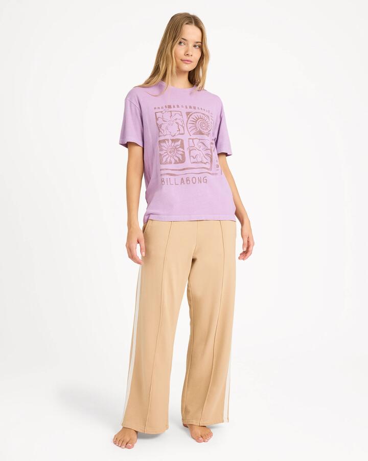 Image of a model wearing Pants. Product name - Billabong Womens Off We Go Track Pants Stone in Stone colour by brand - Billabong