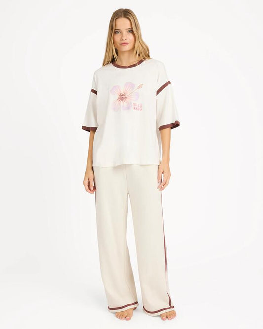 Image of a model wearing Pants. Product name - Billabong Womens Back To It Track Pants Salt Crystal in Salt Crystal colour by brand - Billabong