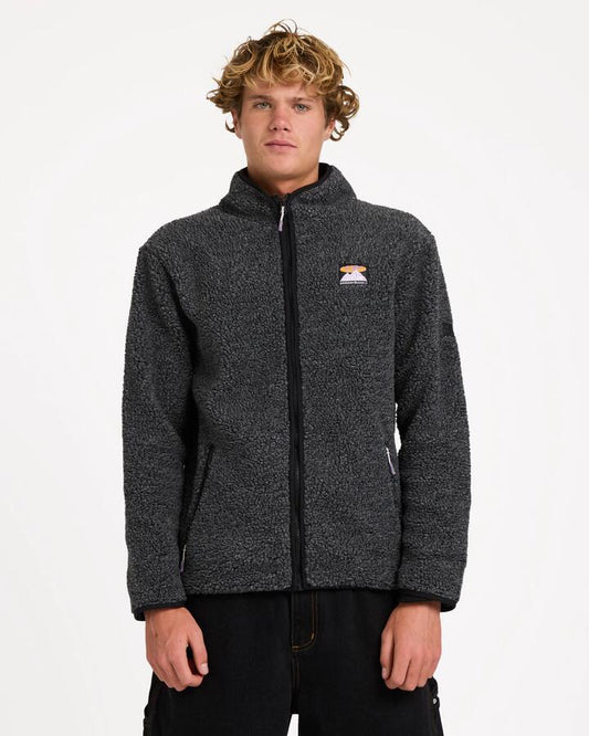 Image of a model wearing Outerwear. Product name - Billabong Mens Boundary Trail Zip Up Fleece Jacket Black Heather in Black Heather colour by brand - Billabong