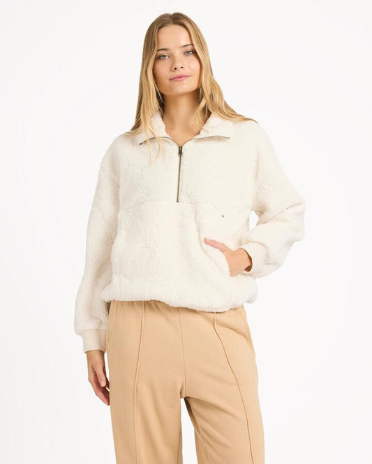 Image of a model wearing Outerwear. Product name - Billabong Womens Rising Tides Half Zip Fleece Jumper Salt Crystal in Salt Crystal colour by brand - Billabong