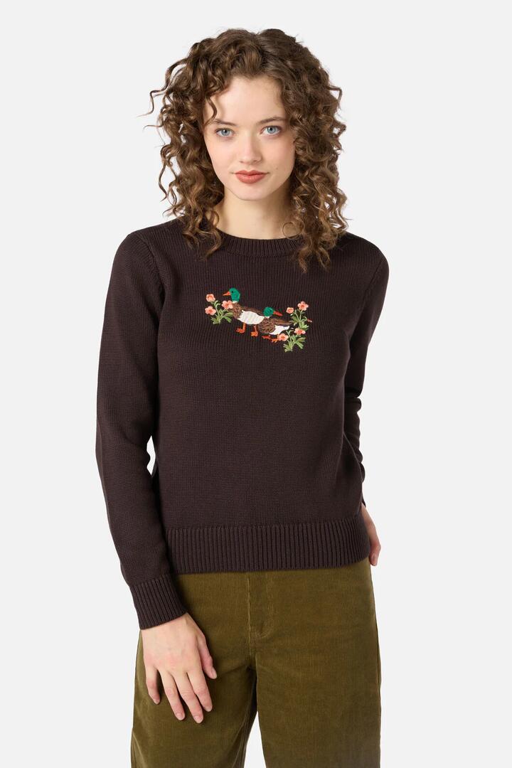 Image of a model wearing Outerwear. Product name - Sweet Ducks Embroidered Jumper in Chocolate colour by brand - Princess Highway
