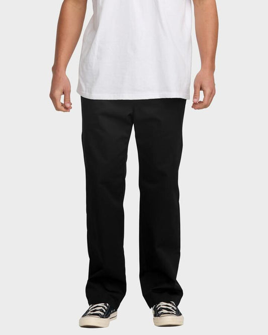 Image of a model wearing Pants. Product name - Billabong Mens Carter Pant Chinos Black in Black colour by brand - Billabong
