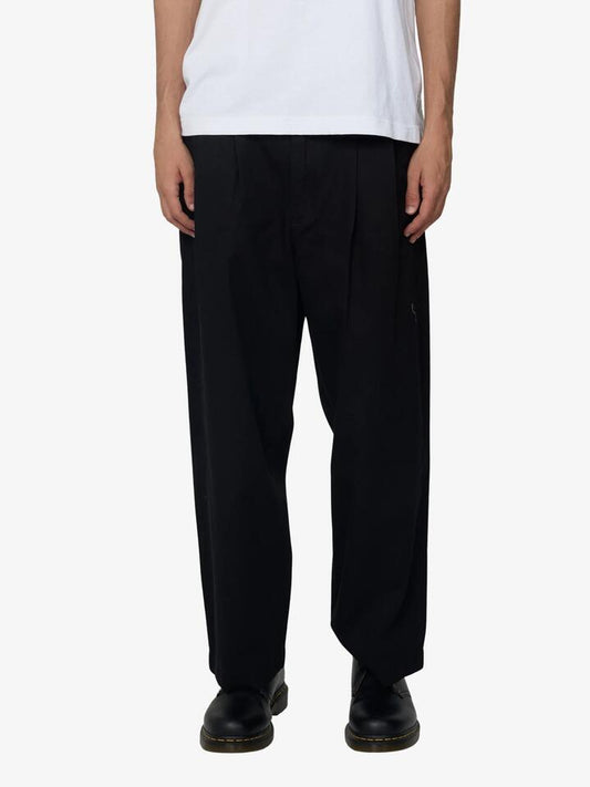 Image of a model wearing Pants. Productname: Article One Nano Pants in Black colour by brand - Article One