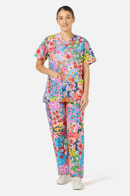 Image of a model wearing Uniforms & Workwear. Product name - Floral Field Scrub Set in Multi colour by brand - Gorman