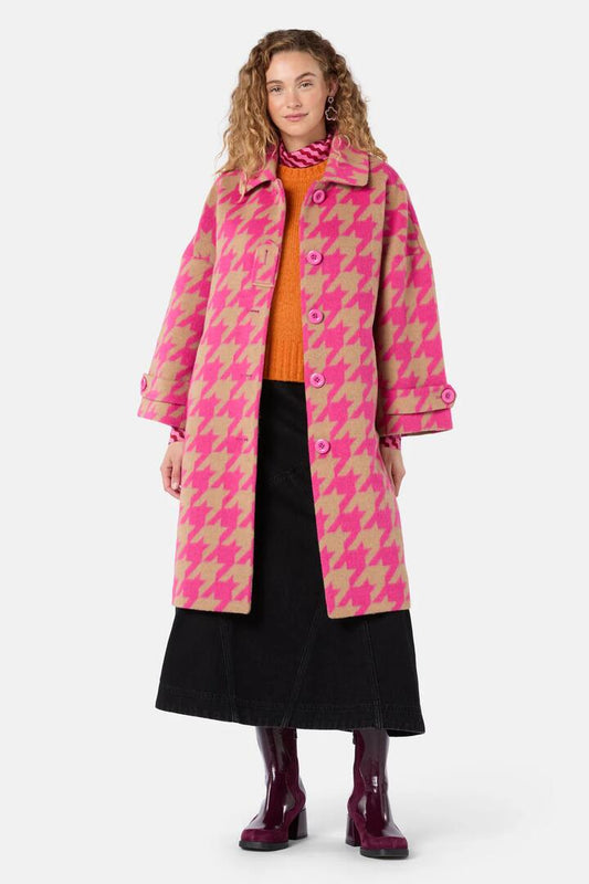 Image of a model wearing Outerwear. Product name - Houndstooth Pink Coat in Pink colour by brand - Gorman