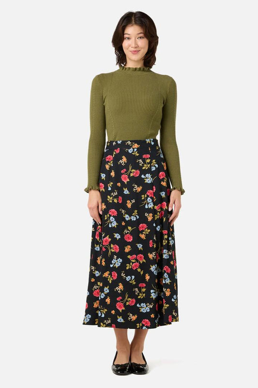 Image of a model wearing Skirts. Productname: Winona Flower Midi Skirt in Black colour by brand - Princess Highway