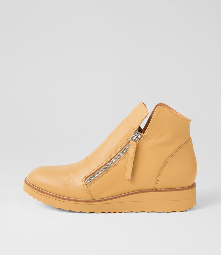 Image of Boots. Product name - Olise Butter Leather Ankle Boots in Butter-Butter Sole colour by brand - MIDAS