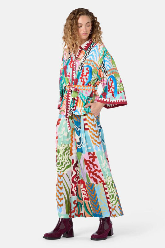 Image of a model wearing Pants. Product name - Zellige Patch Skort in Print colour by brand - Gorman