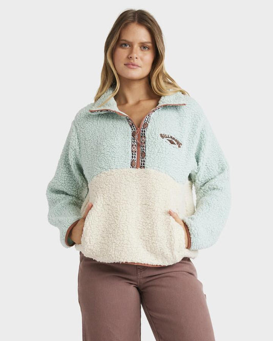 Image of a model wearing Outerwear. Product name - Billabong Womens Horizon Colorblock Half Zip Fleece Jumper Blue Haze in Blue Haze colour by brand - Billabong