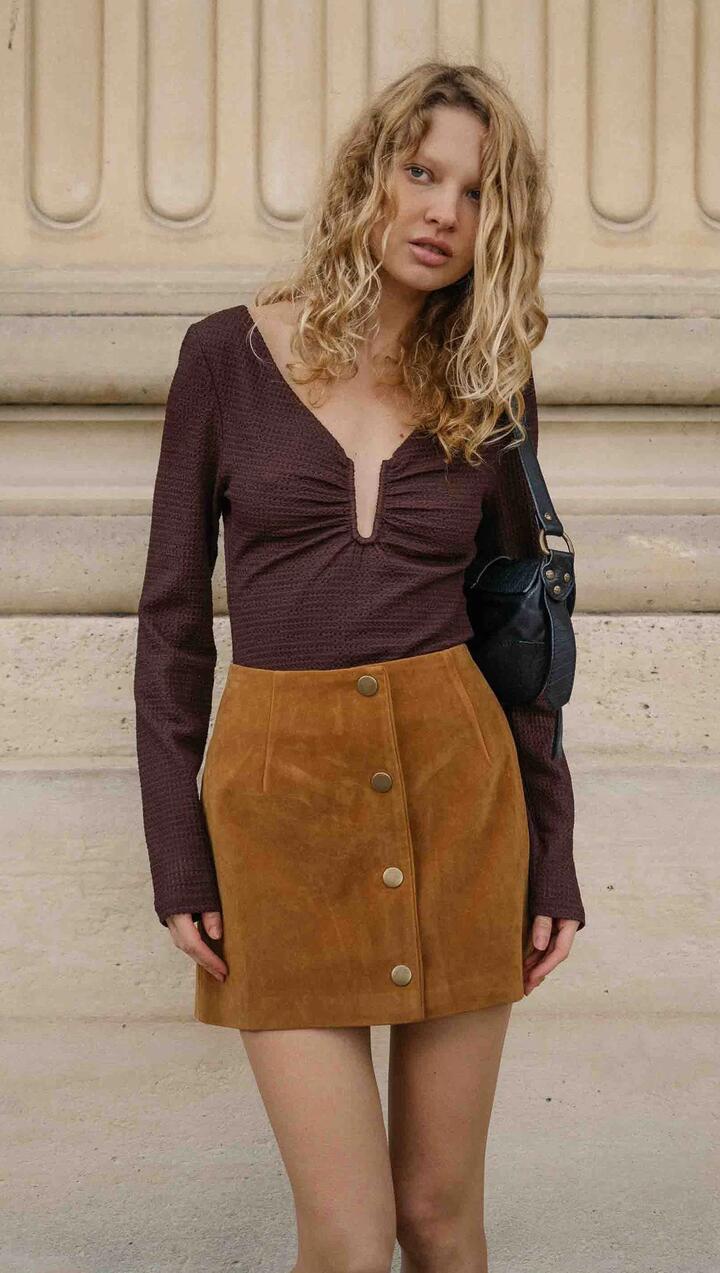 Image of a model wearing Tops. Product name - U Wire Textured Jersey Top in Chocolate in Chocolate colour by brand - MINKPINK