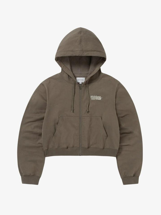 Image of a model wearing Outerwear. Productname: THISISNEVERTHAT Thermal Lt W Zip Up Hoodie in Dark Mocha colour by brand - THISISNEVERTHAT