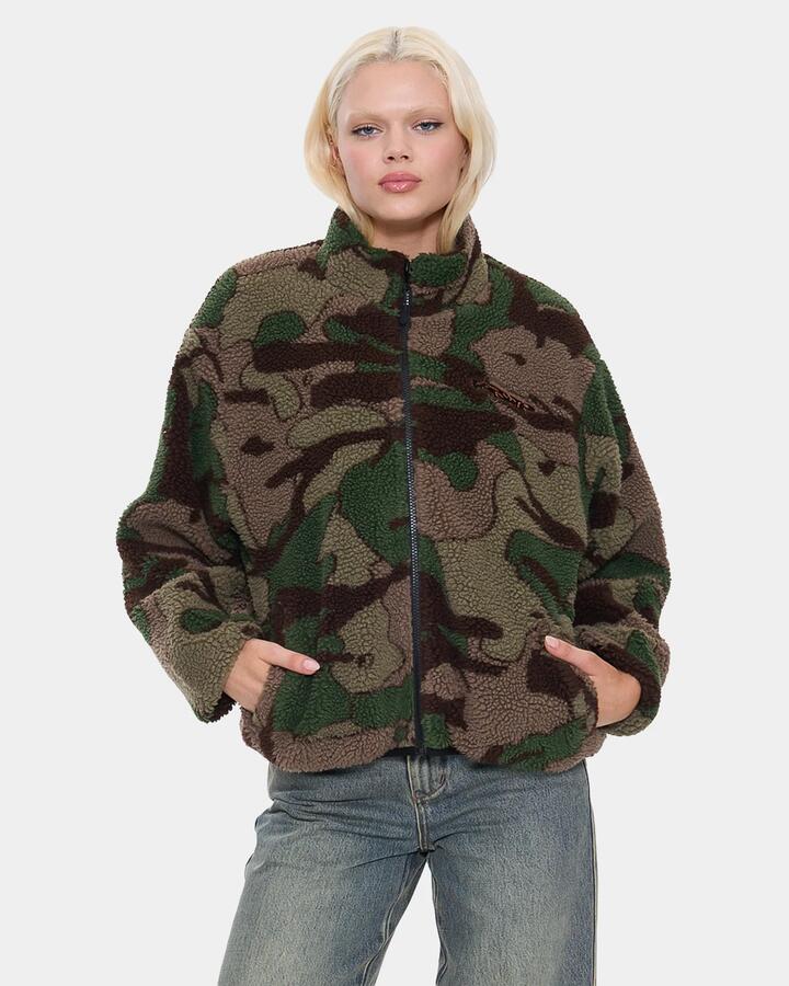 Image of a model wearing Outerwear. Product name - Worship Womens Plain Sight Zip Through Sherpa Fleece Jacket Camo Green in Camo Green colour by brand - Worship