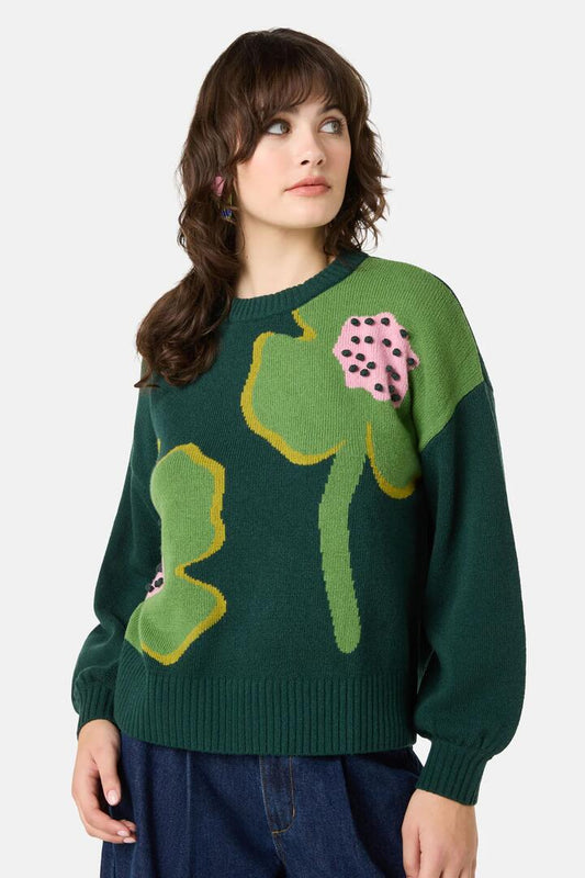 Image of a model wearing Outerwear. Product name - Seedlings Flower Jumper in Multi colour by brand - Gorman