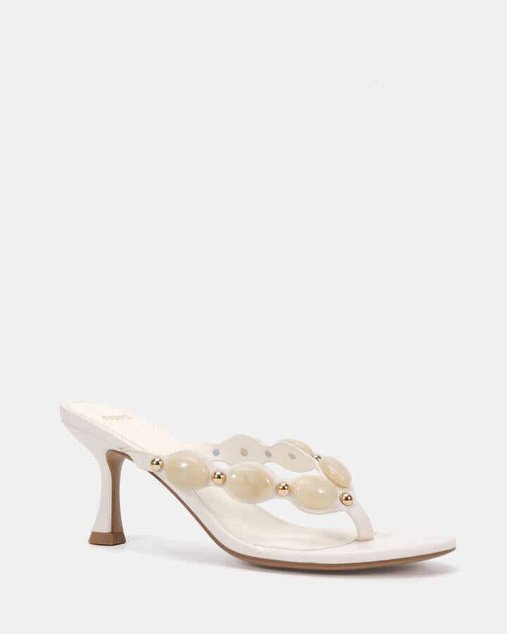 Image of Heels. Product name - Yankie White Vegan Heels in Multi colour by brand - Novo
