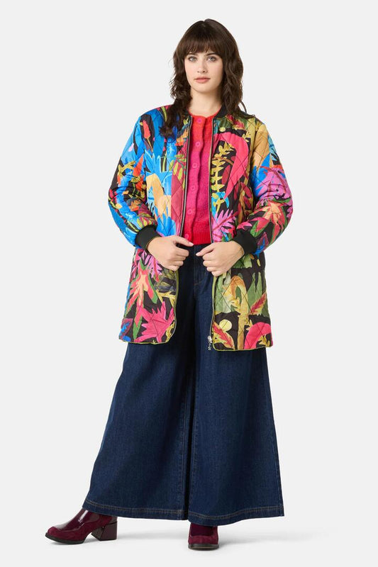 Image of a model wearing Outerwear. Product name - Night Garden Quilted Coat in Print colour by brand - Gorman