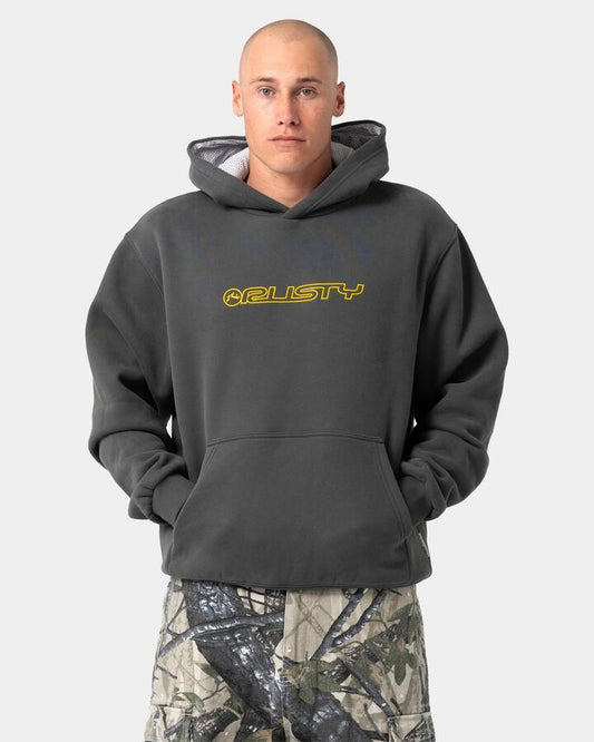 Image of a model wearing Outerwear. Product name - Rusty Mens Outliner Pullover Hoodie Carbon in Carbon colour by brand - Rusty